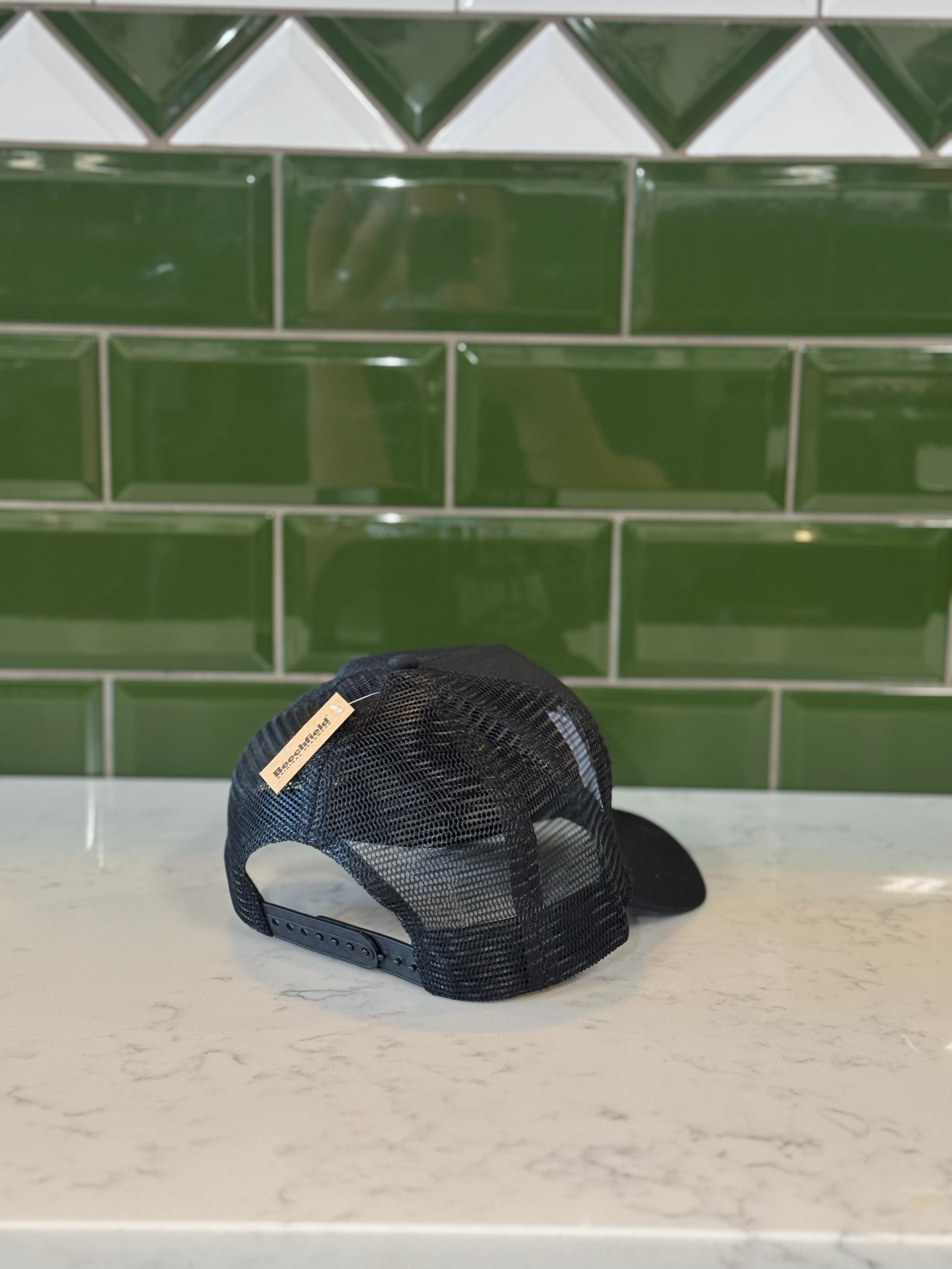 Black Trucker Style Hat With Logo